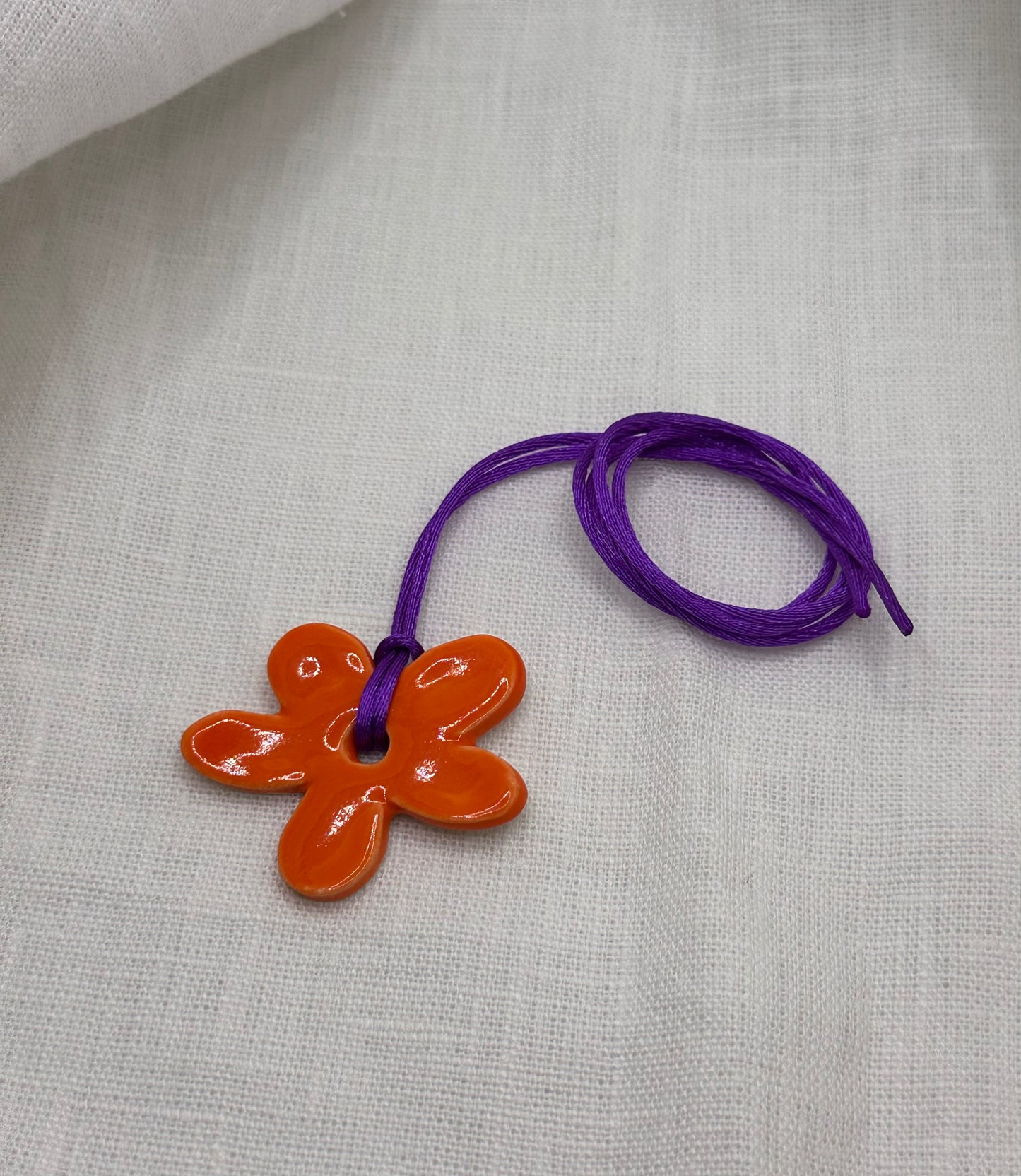 Collier bébé fleur orange