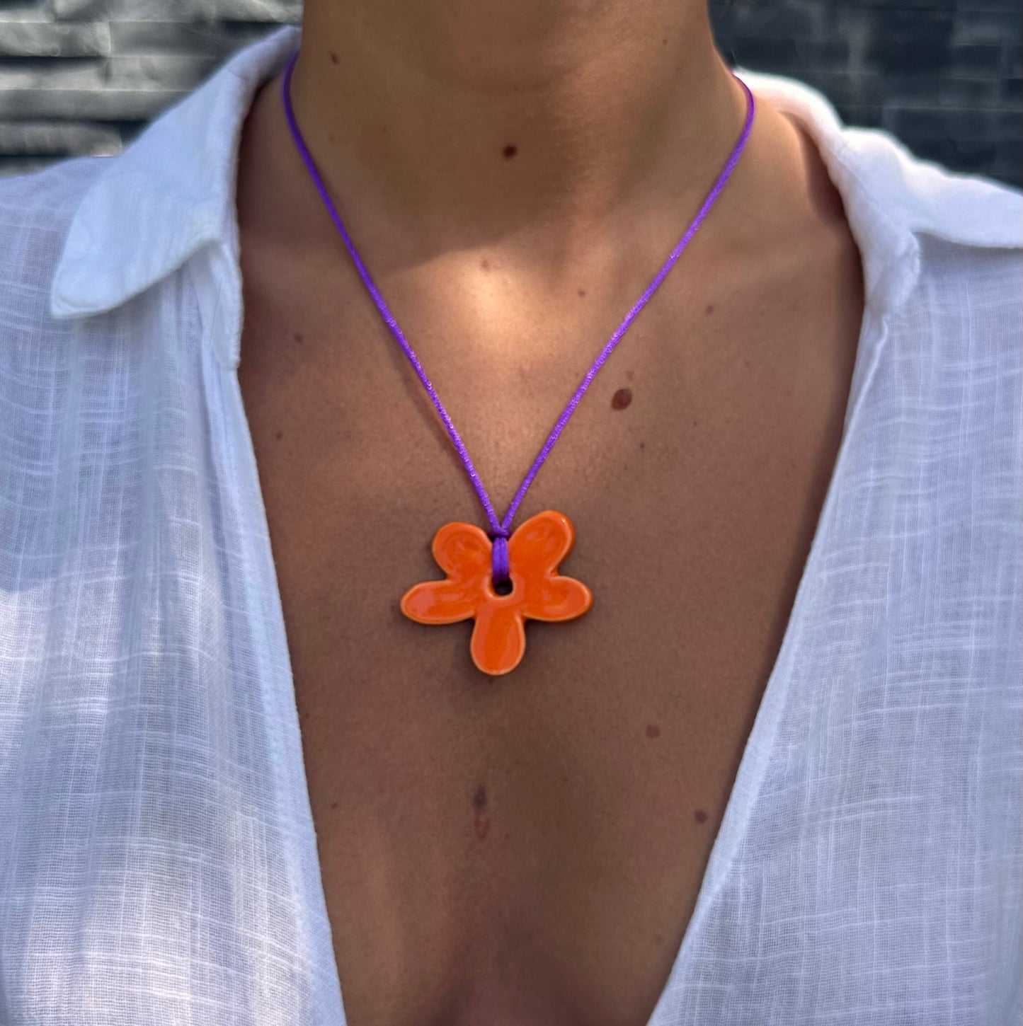 Collier bébé fleur orange